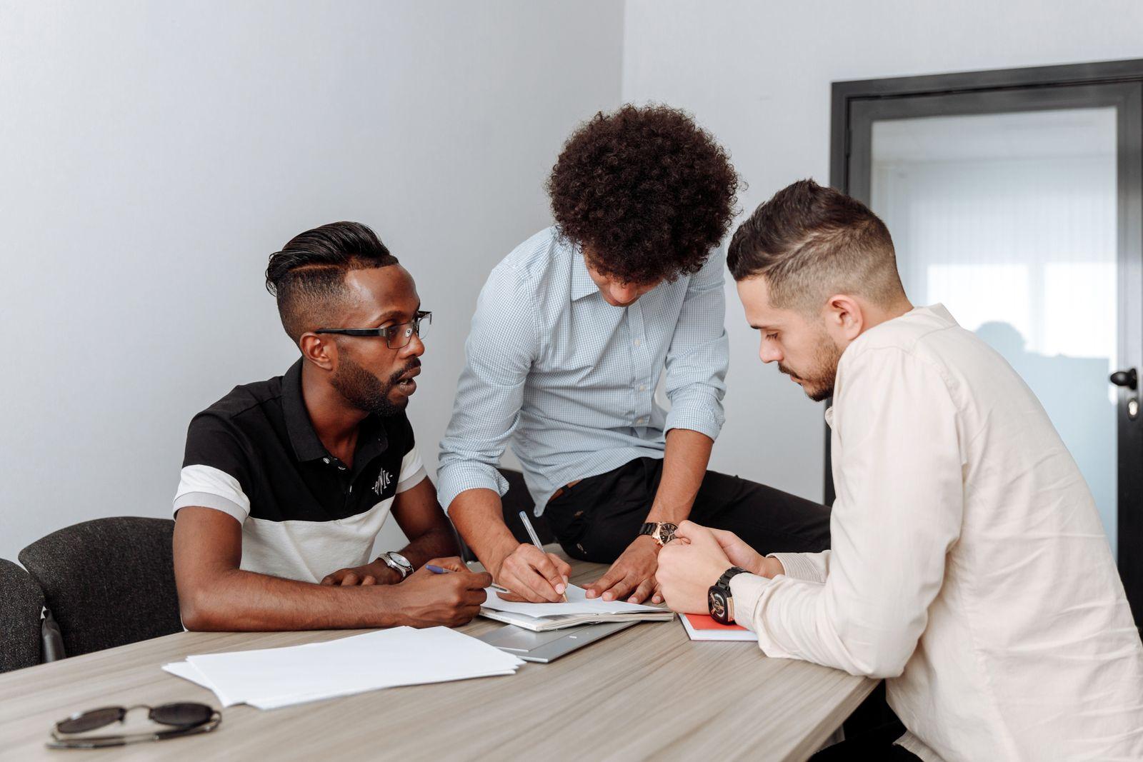 Sales & Business Development professionals collaborating